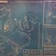 A man holds a large Secretlab instruction sheet.